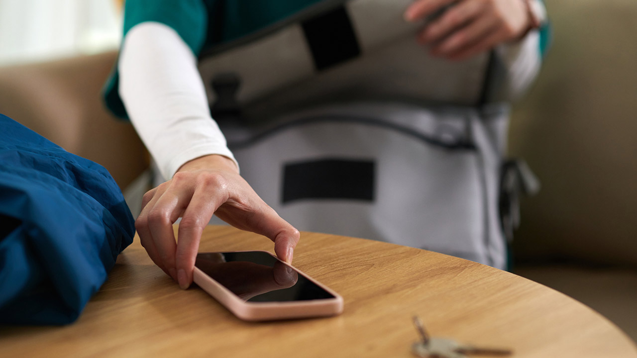 Woman Packing Bag for Work stock photo
